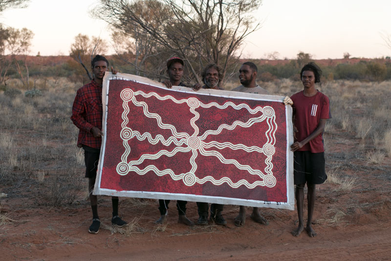 Kayemyn Corby, Duncan Rowe, Dennis Nelson Tjakamarra, Rusty Campbell and Leyman Corby on site with Painting on Country – Kalipinypa. Courtesy Papunya Tjupi Arts, Papunya
