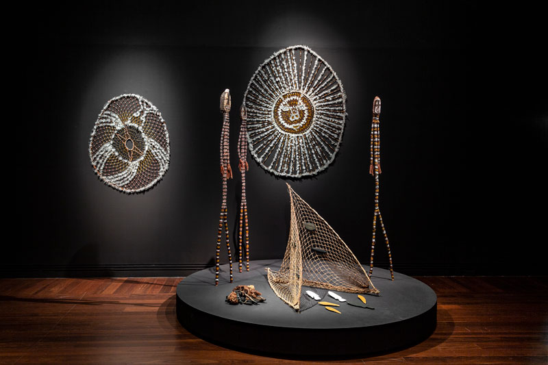 Tarnanthi 2020: Open Hands featuring Karrh (Spider) and Ngalbenbe (sun story) by Lena Yarinkura. Installation view, Art Gallery of South Australia © Lena Yarinkura/Maningrida Arts and Culture/Copyright Agency. Photo: Saul Steed
