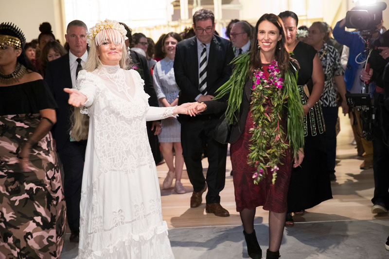 Pacific Sister Ani O’Neill leads Prime Minister Jacinda Ardern into Toi Art, 16 March 2018. Photo: Kate Whitley