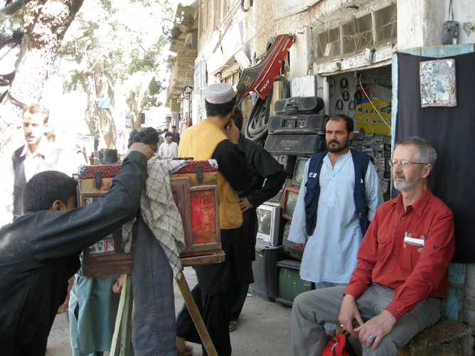 Nigel Lendon being photographed by a street photographer in Herat, Afghanistan, 2007. courtesy of Pam McGrath