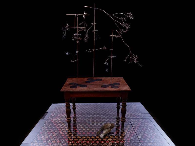 Louiseann King, arbor temporis momentum – genere (detail), 2017, bronze, vintage laboratory fittings, vintage sewing machine fittings, early colonial Australian cedar table, 1890’s silk & paper quilt, glass. Photo: Danny Wootton
