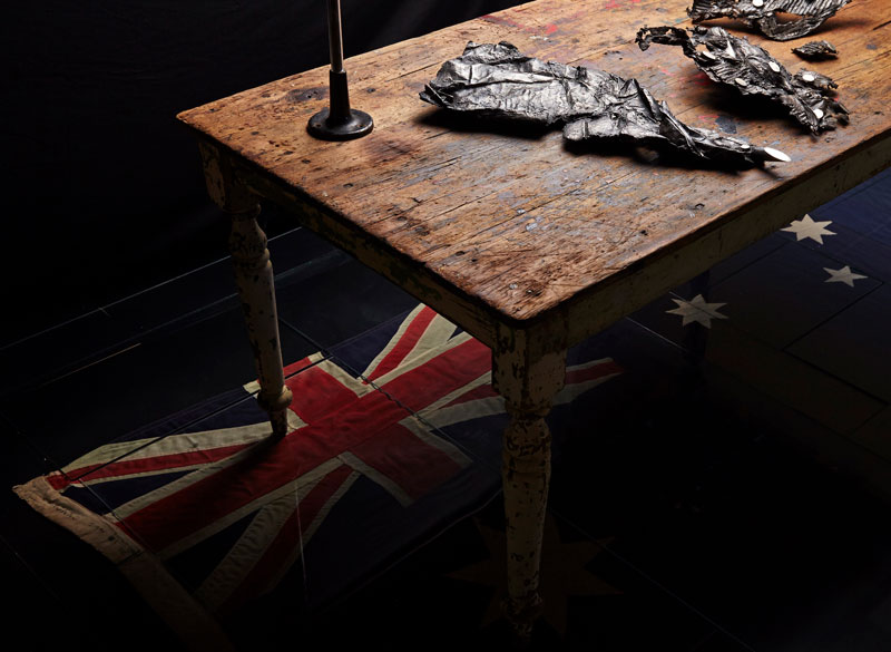 Louisann King, arbor temporis momentum – chartam (detail), 2017, bronze, vintage scientific glass tubes, early Australian pine table, vintage steel stand, vintage cotton handmade Australian flag, vintage window glass. Photo: Danny Wootton