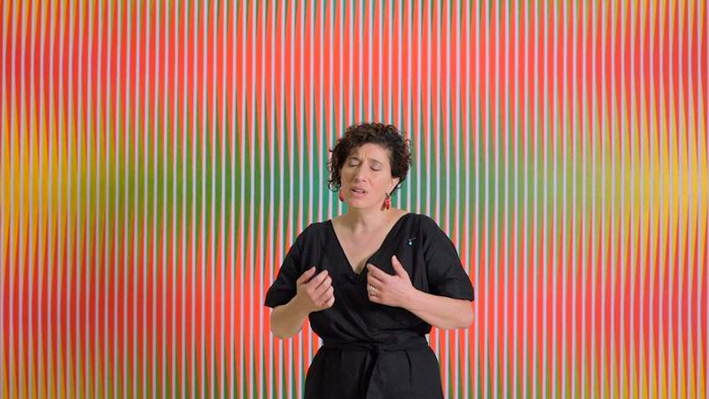 Still from Together In Art performance: Maissa Alameddine sings in front of Solstice (1974) by Lesley Dumbrell at the Art Gallery of NSW. Photo: Matt McGuigan/Hospital Hill 