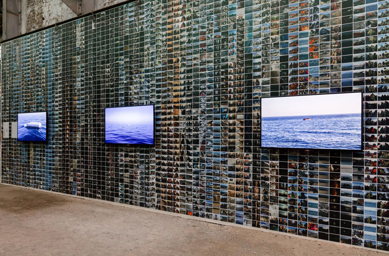 Installation view. Wall of photos by Ai Weiwei