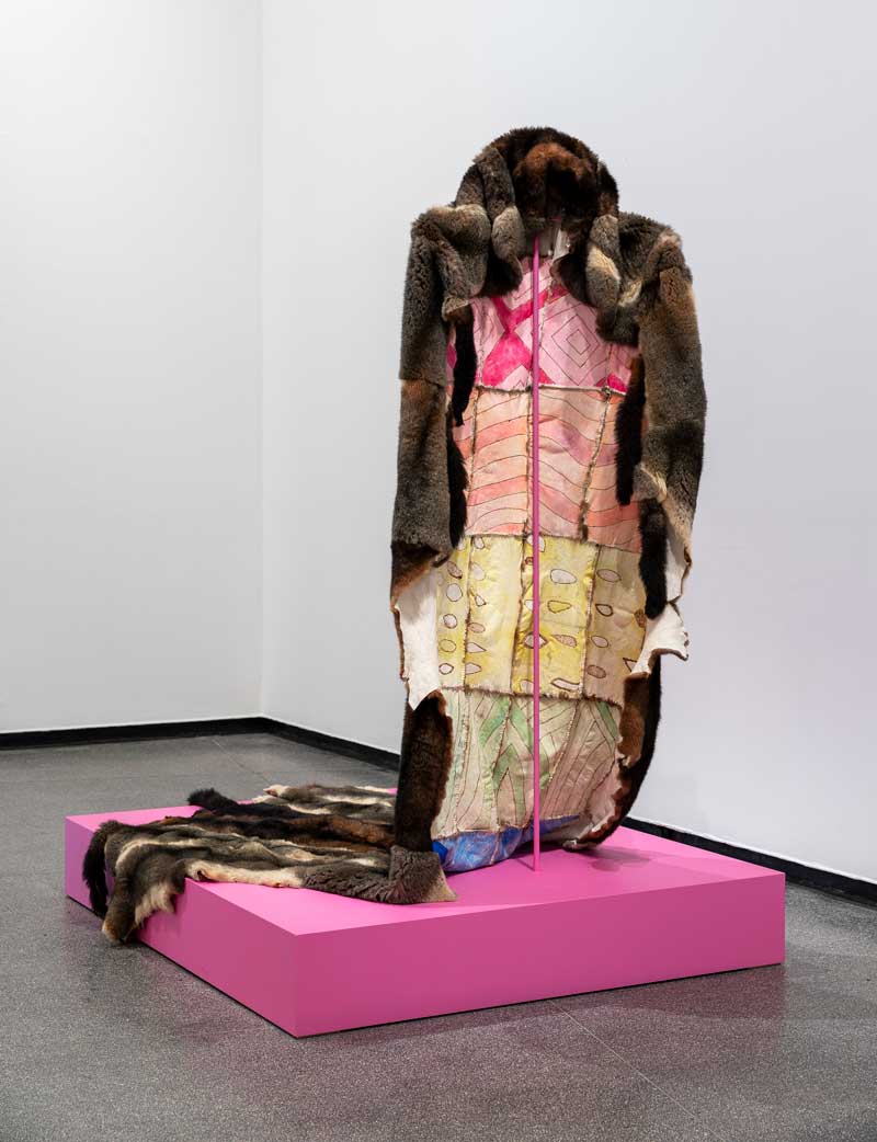 Peter Waples-Crowe, Ngarigo Queen – Cloak of Queer Visibility, 2018 possum pelts, waxed linen thread, leather dyes, pokerwork. Installation view, Australian Centre for Contemporary Art, Melbourne