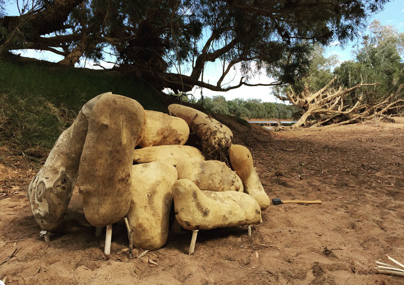 Jangarra Armchair (in progress) on the banks of the Fitzroy River. Rita Minga, Johnny Nargoodah, Trent Jansen, Gene Tighe, Elsie Dickens, Duane Shaw, Illiam Nargoodah, Myarn Lawford, Eva Nargoodah and Yangkarni Penny K-Lyons, 2017, Jartalu wood, gum branches, human hair and fasteners. Photo: Trent Jansen. Courtesy and © the artist, Mangkaja Arts and Fremantle Arts Centre