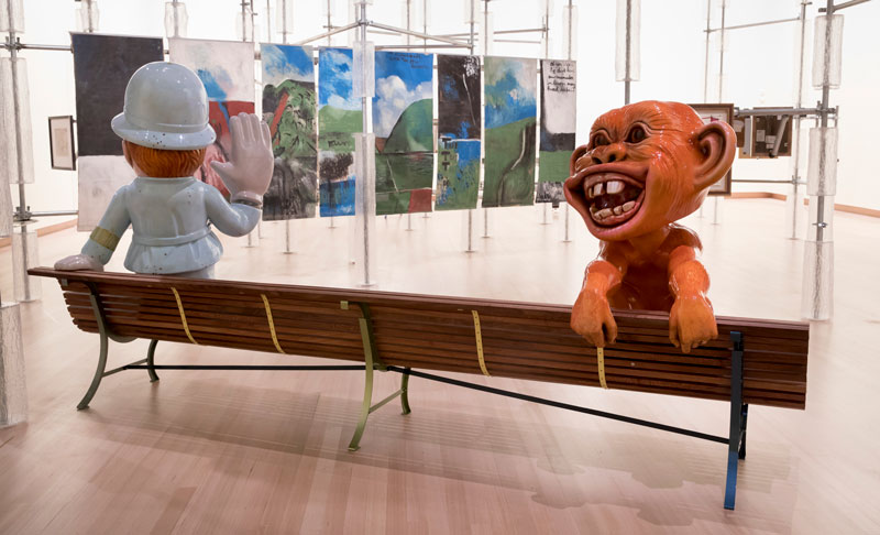 Michael Parekowhai,Détour,2018, installation view; Michael Parekowhai, Constable Plum Bob, 2018, and Hoodwinked, 2018, fibreglass, automotive paint, with Colin McCahon, Northland Panels, 1958. Photo: Maarten Holl
