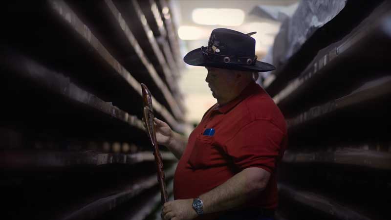 Darryl Thomas exploring the South Australian Museum collection. Photo: Dave Laslett, courtesy of Ku Arts