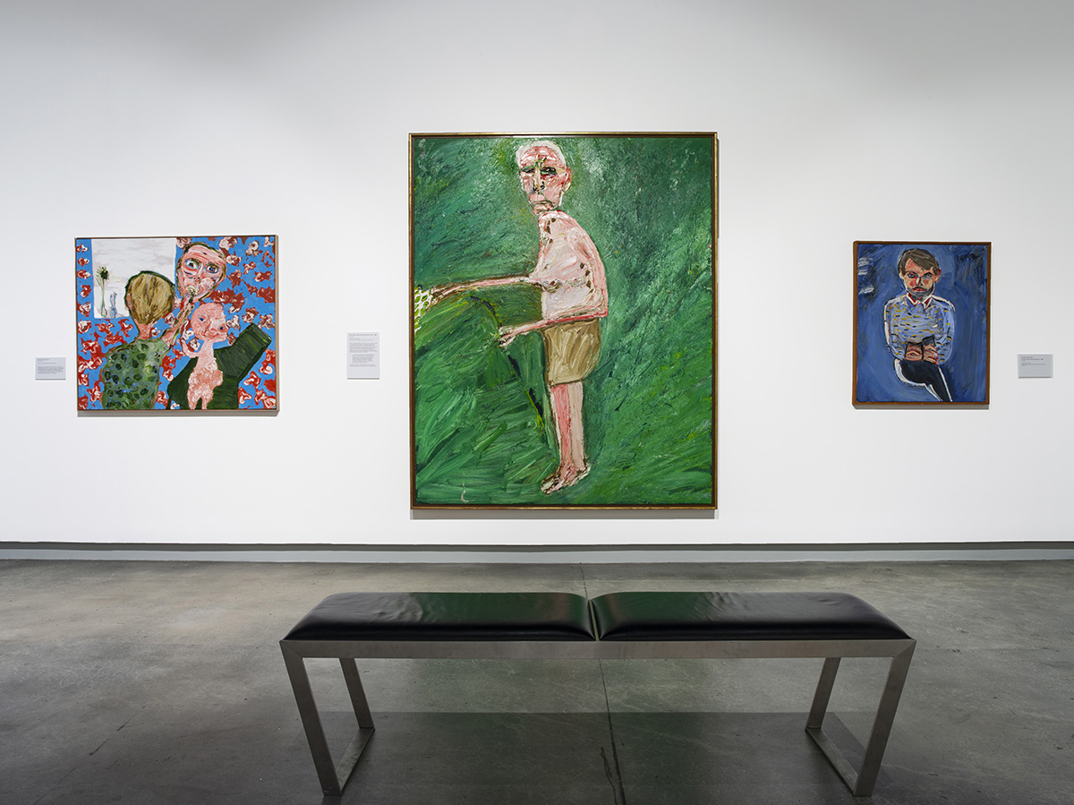 Paintings in white walled gallery